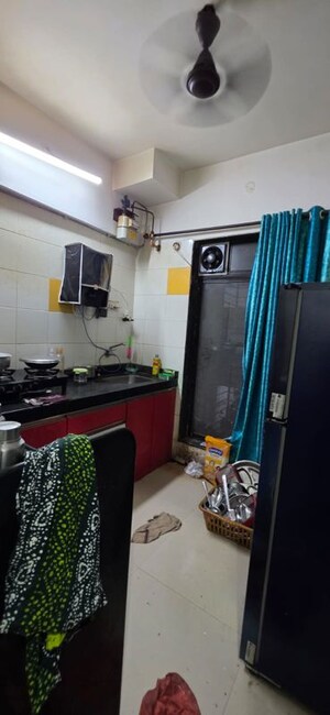 Kitchen in 2 BHK Apartment at Ghanshyam Bhuvan Building, Ghansoli Sector 3 – for Sale