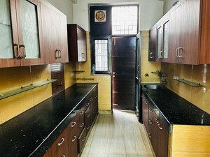 Kitchen in 3 BHK Apartment at Mahagun Moderne, Sector 78 – for Rent