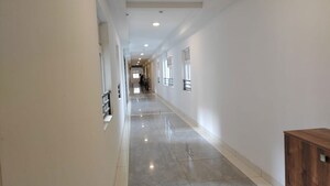 Building Lobby in 3.5 BHK Apartment at Prestige Tranquil, Kokapet – for Rent