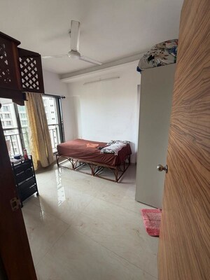 Living Room in 1.5 BHK Apartment at Prayag Heights, Dindoshi – for Sale