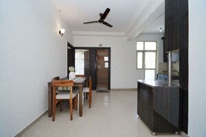 Living Room in 2 BHK Apartment at Kingswood Court, Sain Vihar – for Sale