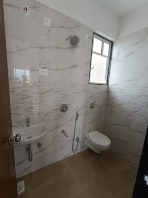 Bathroom in 2 BHK Apartment at Dynamic Imperia Plus, Pisoli – for Rent