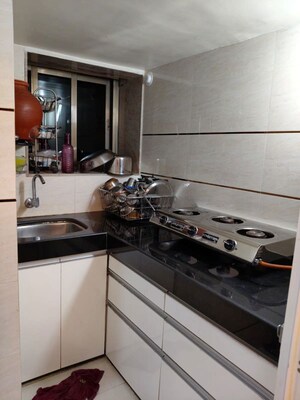Kitchen in 1 RK Apartment at Vasant Valley Complex, Malad East – for Rent