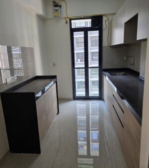 Kitchen in 2 BHK Apartment at Our Home CHS, Andheri West – for Sale
