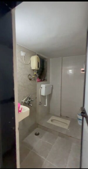 Bathroom in 2 BHK Apartment at Ravi Group Gaurav City, Mira Road – for Sale