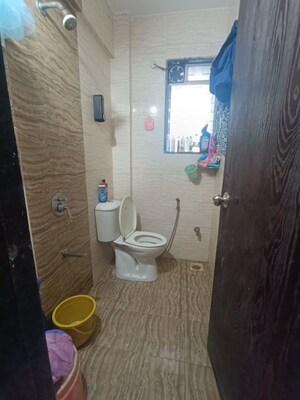 Bathroom in 1 BHK Apartment at Marvel Shanti Heights, Kopar Khairane – for Rent