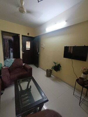 Living Room in 1 BHK Apartment at Marvel Shanti Heights, Kopar Khairane – for Rent