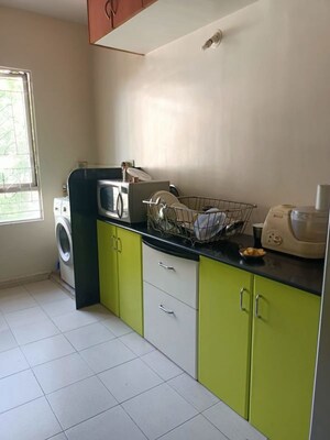 Kitchen in 2 BHK Apartment at Naiknavare Sylvan Premium, Aundh – for Rent