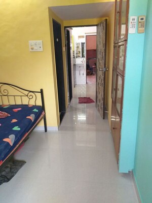Building Lobby in 1 BHK Apartment at Harjas CHS, Ic Colony – for Rent