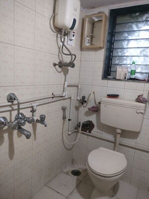 Bathroom in 2 BHK Apartment at Vaibhav Vilas CHS, Majiwada – for Sale
