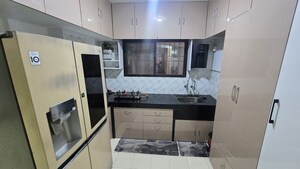 Kitchen in 1 BHK Apartment at Magarpatta City Heliconia, Hadapsar – for Rent