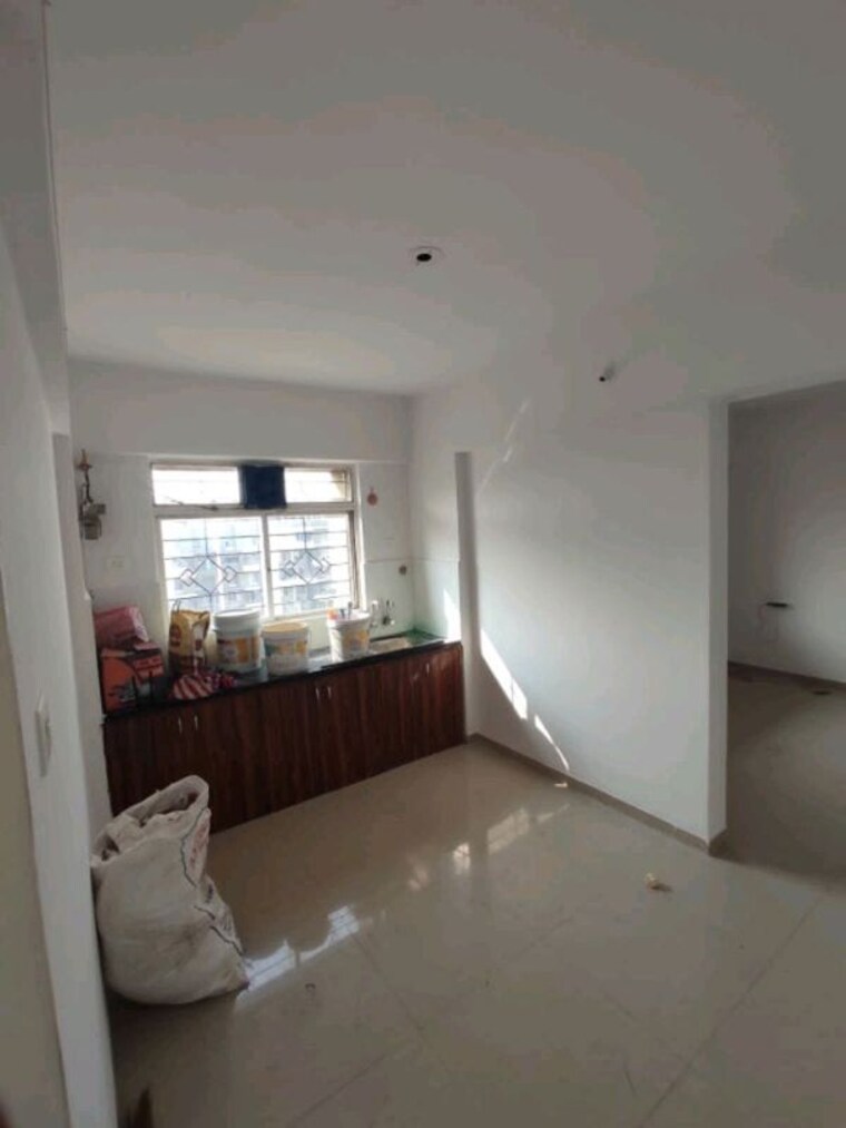 Kitchen, palladium-homes 1 Bedroom 500 Sq.Ft. Apartment In Dhanori Pune 10573872
