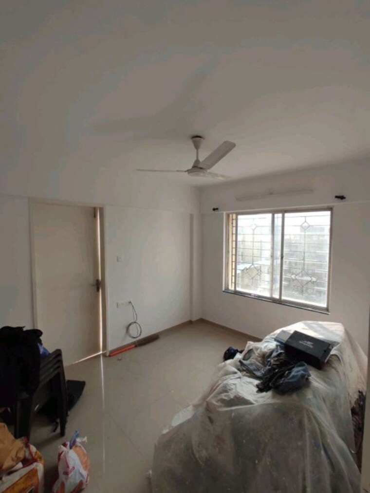 Living Room, palladium-homes 1 Bedroom 500 Sq.Ft. Apartment In Dhanori Pune 10573872