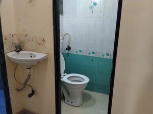 Bathroom in 2 BHK Apartment at Athshree CHS, Kopar Khairane – for Rent