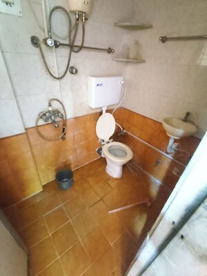 Attached Bathroom in 1 BHK Apartment at Kavya Hill View CHS, Anand Nagar – for Sale