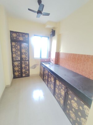 Kitchen in 1 BHK Apartment at Kavya Hill View CHS, Anand Nagar – for Sale