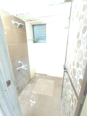 Bathroom in 1 BHK Apartment at Kavya Hill View CHS, Anand Nagar – for Sale
