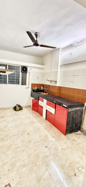 Kitchen in 2 BHK Apartment at Punyadham Society, Wadgaon Sheri – for Rent