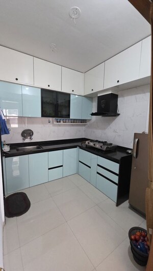 Kitchen in 2 BHK Apartment at Aksha Vrundavan, Chikhali – for Rent