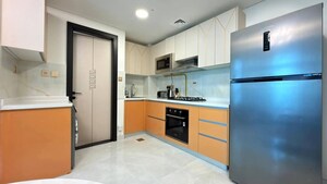 Kitchen in 2 BHK Apartment at Dosti Planet North, Shilphata – for Sale