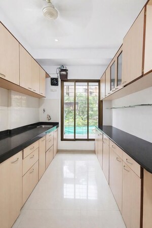 Kitchen in 1 BHK Apartment at Prime CHS, Mulund East – for Rent