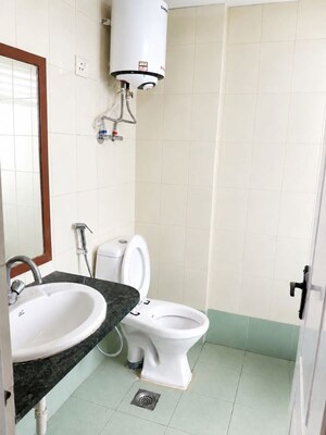 Bathroom in 1 BHK Apartment at Shree Vardhman Green Court, Sector 90 – for Rent