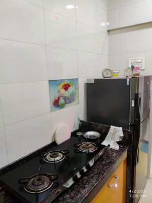 Kitchen in 2 BHK Apartment at Rustomjee Urbania Acura, Thane West – for Rent