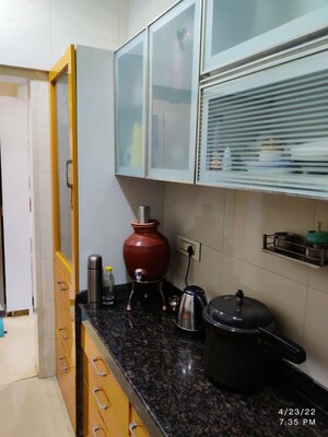 Kitchen in 2 BHK Apartment at Rustomjee Urbania Acura, Thane West – for Rent