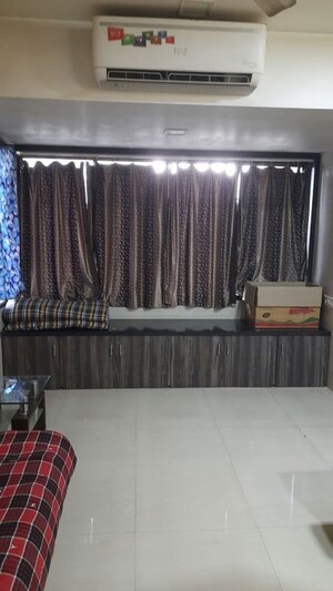 Living Room in 1 BHK Apartment at Omkar CHS Kamothe, Kamothe – for Rent