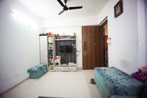 Living Room in 2 BHK Apartment at Narol – for Sale