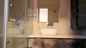 Bathroom in 4 BHK Apartment at Ambience Caitriona, Sector 24 – for Sale
