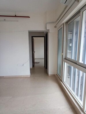 Living Room in 1 BHK Apartment at Omkar Signet, Malad East – for Rent