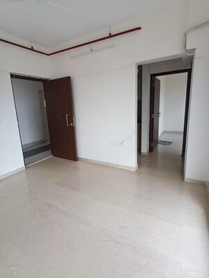 Living Room in 1 BHK Apartment at Omkar Signet, Malad East – for Rent