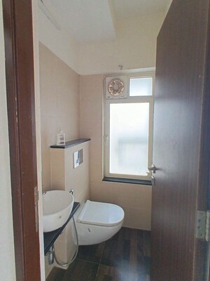 Bathroom in 1 BHK Apartment at Omkar Signet, Malad East – for Rent