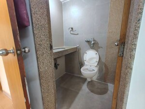 Bathroom in 2 BHK Apartment at Puranik City, Kasarvadavali – for Rent