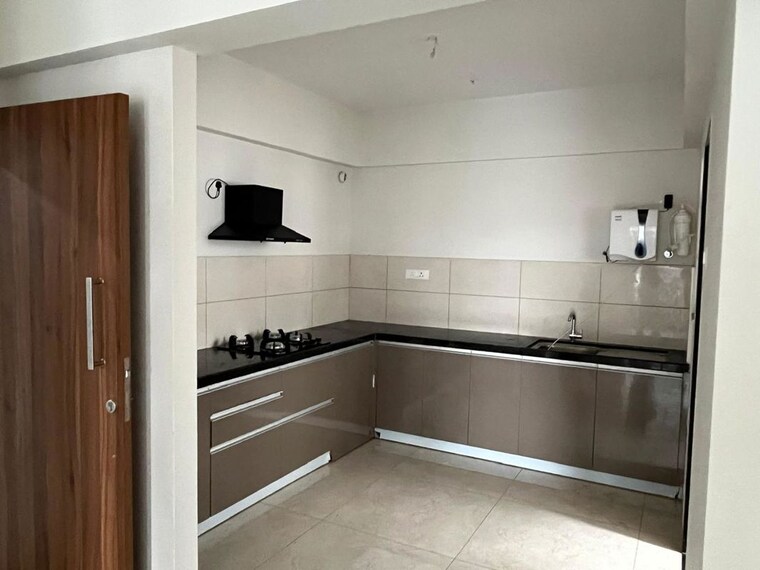 Kitchen, geras-world-of-joy-s 2 Bedroom 879 Sq.Ft. Apartment In Kharadi Pune 10574733