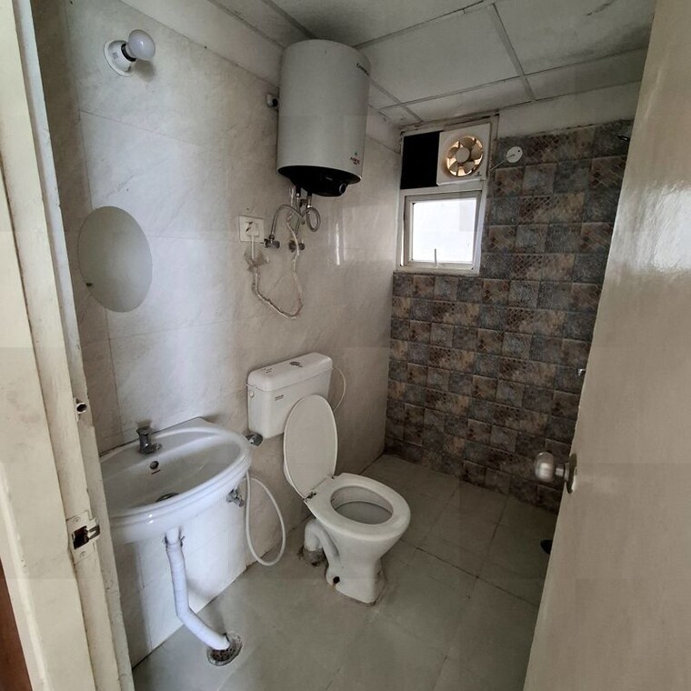 Bathroom, signature-global-the-millennia 2 Bedroom 850 Sq.Ft. Apartment In Sector 37d Gurgaon 10574798