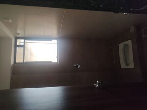 Bathroom in 3 BHK Apartment at Nexus Gulmohar, Charholi Budruk – for Rent