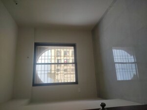 Bedroom in 3 BHK Apartment at Nexus Gulmohar, Charholi Budruk – for Rent