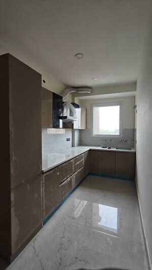 Kitchen in 3 BHK Builder Floor at Amolik Aster Woods, Sector 98 – for Sale