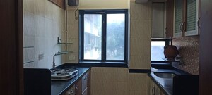 Kitchen in 2 BHK Apartment at Shubhada Tower, Worli – for Rent