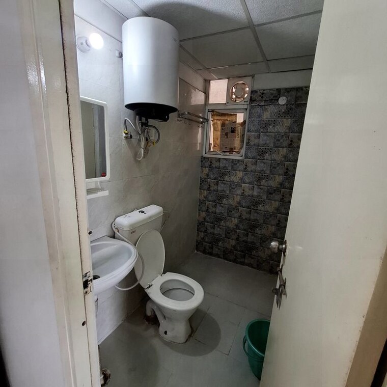 Bathroom, signature-global-the-millennia 2 Bedroom 850 Sq.Ft. Apartment In Sector 37d Gurgaon 10574868
