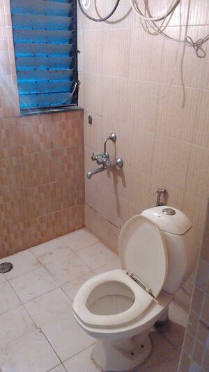 Bathroom in 2 BHK Apartment at Mittal Silver Crescent, Kharadi – for Rent