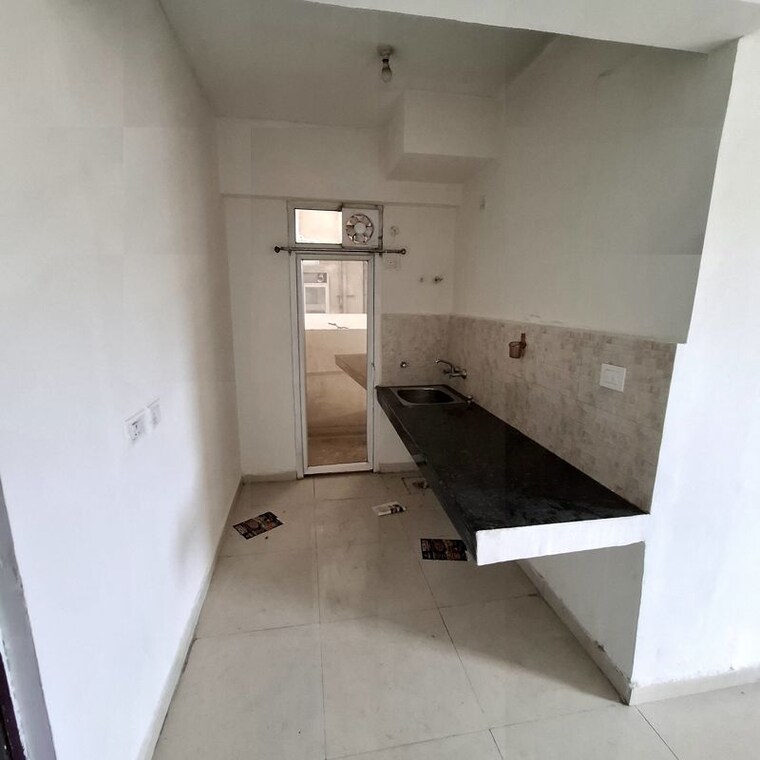 Kitchen, signature-global-the-millennia 2 Bedroom 850 Sq.Ft. Apartment In Sector 37d Gurgaon 10574932