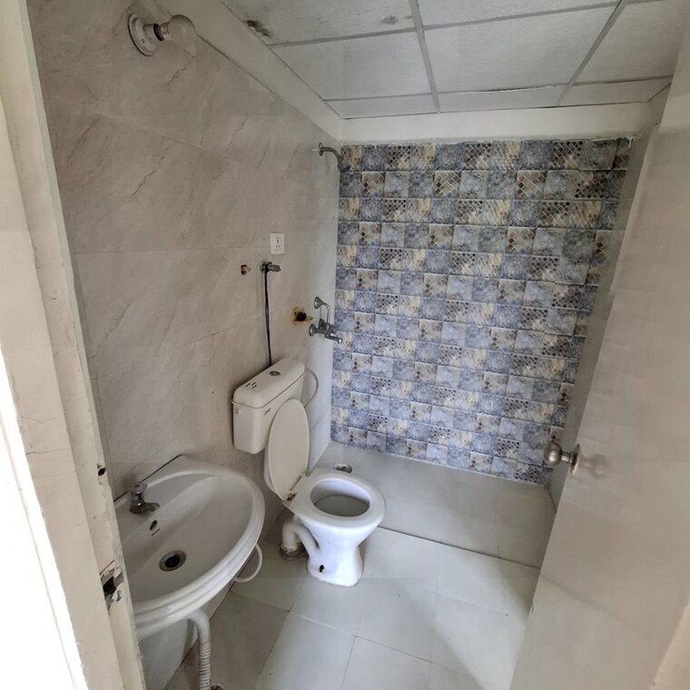 Bathroom, signature-global-the-millennia 2 Bedroom 850 Sq.Ft. Apartment In Sector 37d Gurgaon 10574932