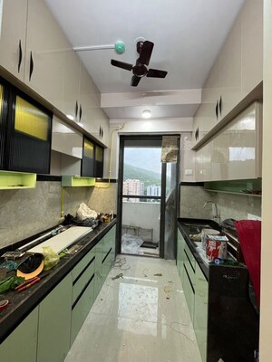 Kitchen in 1 BHK Apartment at Unnathi Woods Phase 3, Ghodbunder Road – for Rent