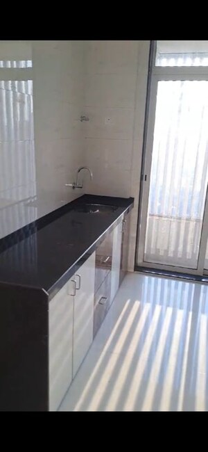 Kitchen in 2 BHK Apartment at Shreeji Atlantis, Malad West – for Sale