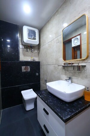 Bathroom in 4 BHK Builder Floor at Sector 43 – for Rent