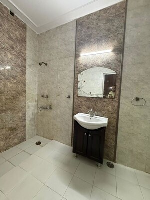 Bathroom in 3 BHK Builder Floor at Kalkaji – for Rent