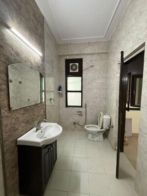 Bathroom in 3 BHK Builder Floor at Kalkaji – for Rent